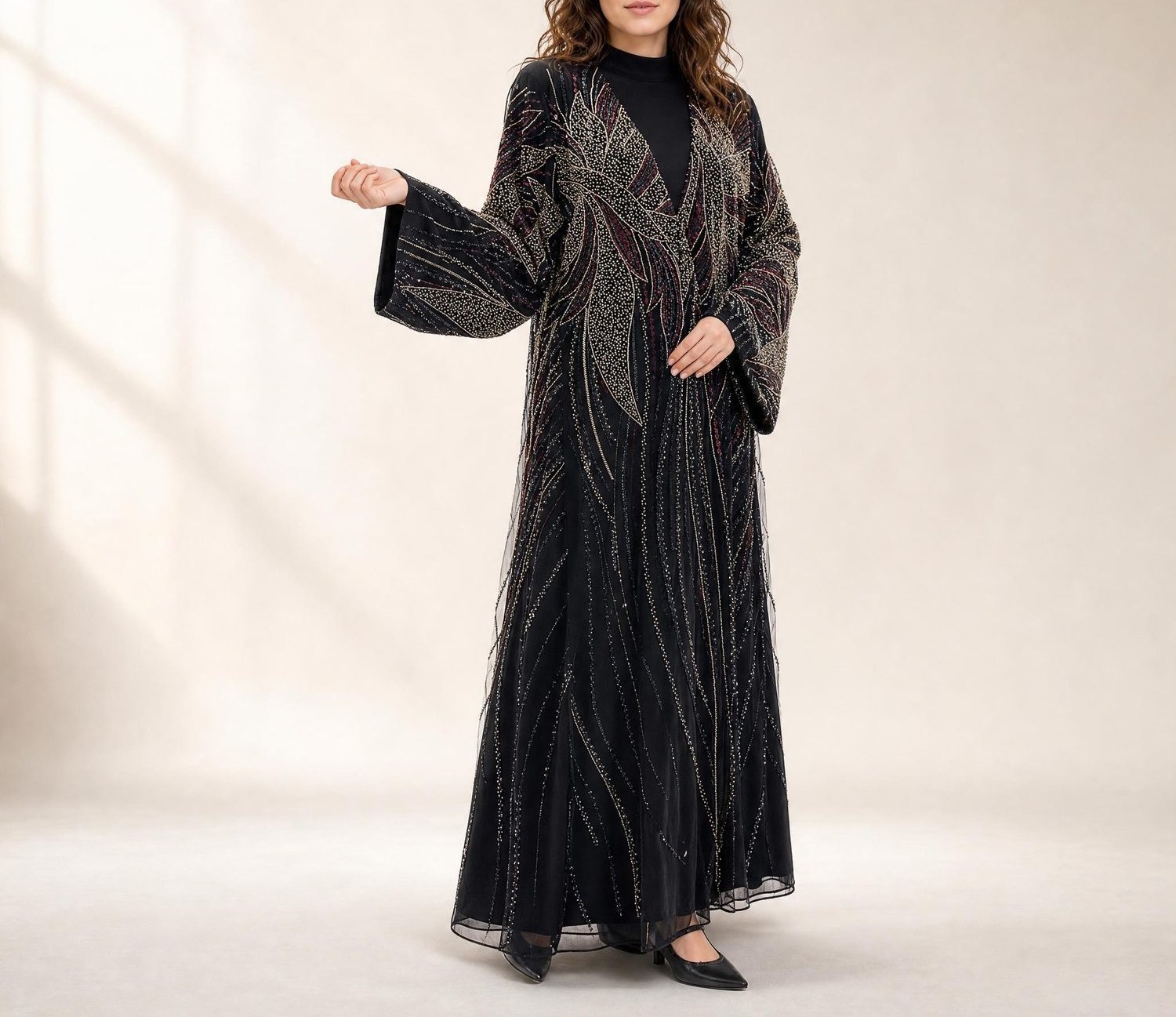 The Signature Drape — black feather-beaded abaya